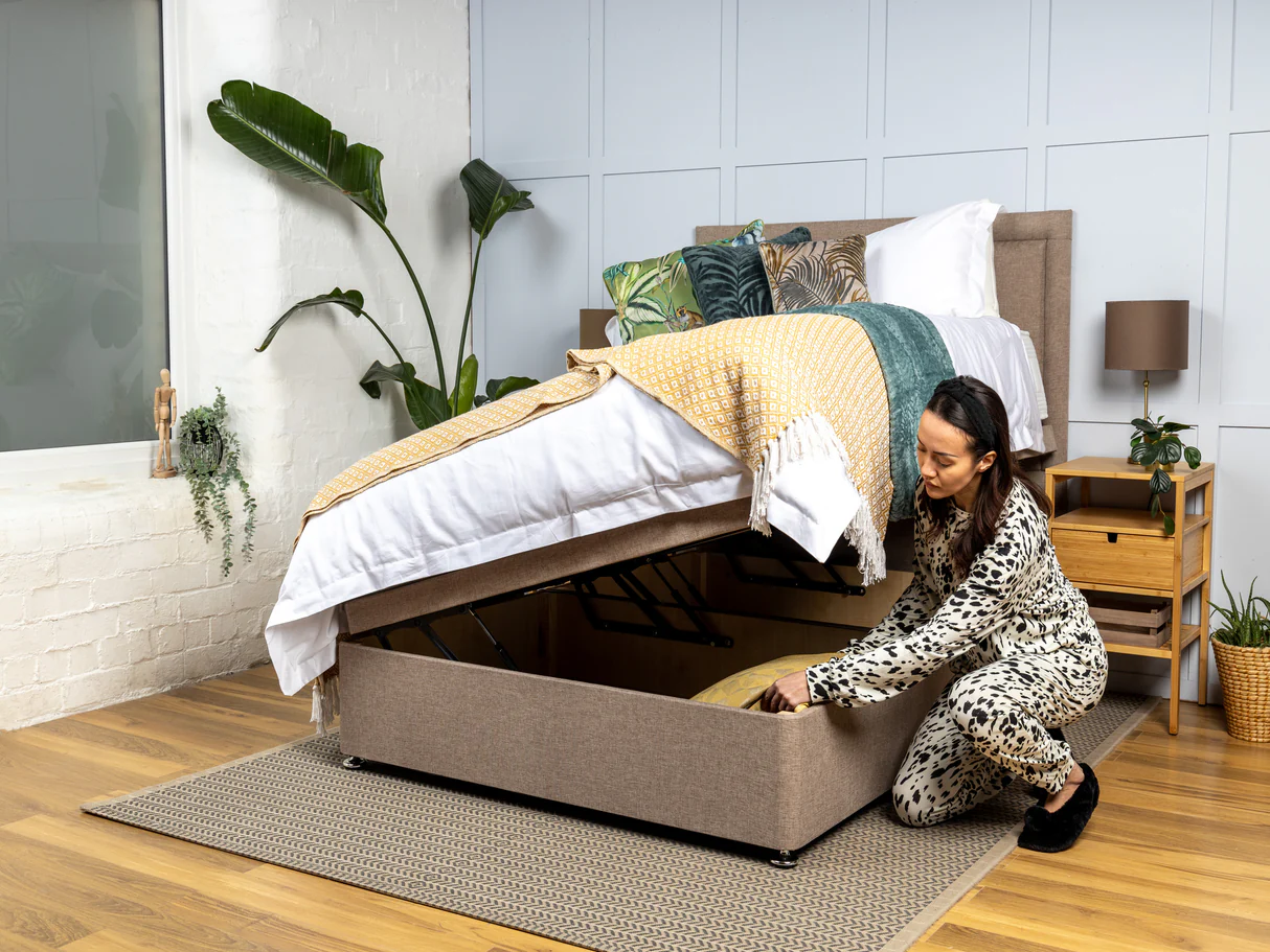 woman opening a side open ottoman bed